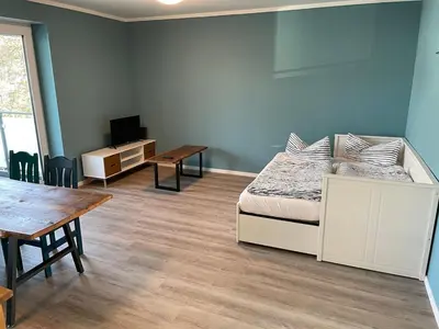TV/Unterhaltungsangebot in der Unterkunft Zentrale Neubauwohnung mit Balkon