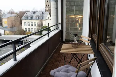 Ein Balkon oder eine Terrasse in der Unterkunft RheinmeetsMosel Rheinufer Deutsches Eck