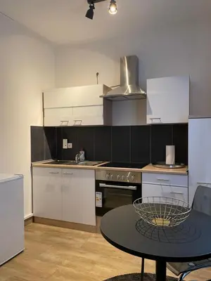 Küche/Küchenzeile in der Unterkunft City Apartments Trier Suite 3