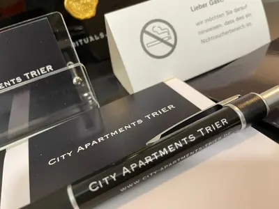 Ein Zertifikat, Auszeichnung, Logo oder anderes Dokument, das in der Unterkunft City Apartments Trier Suite 4 ausgestellt ist