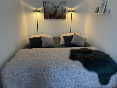 Ein Bett oder Betten in einem Zimmer der Unterkunft Ferienwohnung am Salmtalradweg Region Eifel Mosel