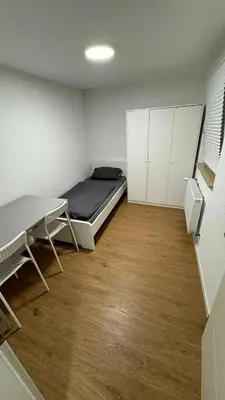 Ein Bett oder Betten in einem Zimmer der Unterkunft EasyFlat Apartment WE26