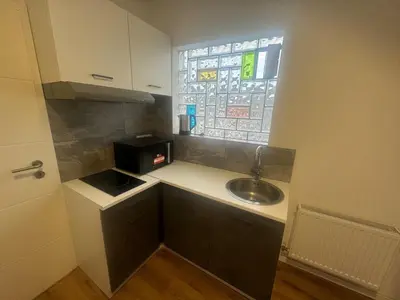 Küche/Küchenzeile in der Unterkunft Home-Base Apartment WE28