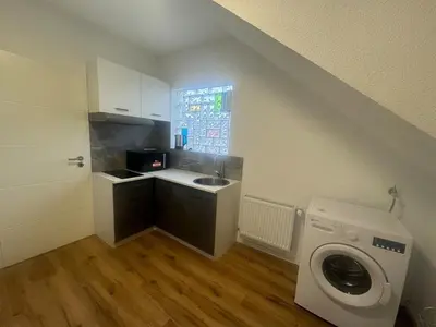 Küche/Küchenzeile in der Unterkunft Home-Base Apartment WE28