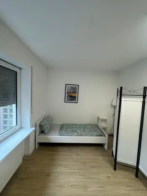 Ein Bett oder Betten in einem Zimmer der Unterkunft StadtQuartier am Rhein WE31