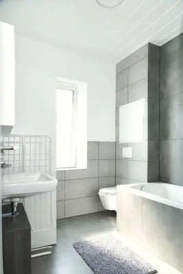 Ein Badezimmer in der Unterkunft StadtRaum mit 3 Zimmer am Rhein WE5