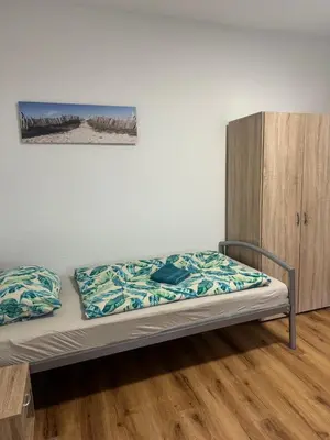 Ein Bett oder Betten in einem Zimmer der Unterkunft Tag & Nacht Apartment WE27