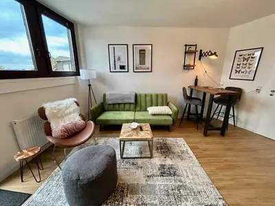 Ein Sitzbereich in der Unterkunft Karl Central Flats - Netflix - Parkplatz - Balkon