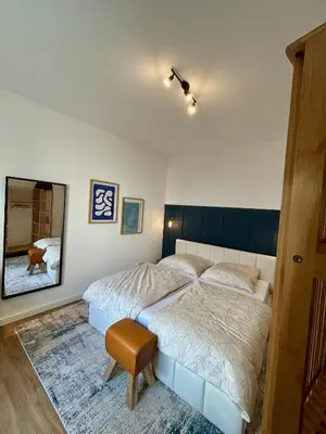 Ein Bett oder Betten in einem Zimmer der Unterkunft Karl Central Flats - Netflix - Parkplatz - Balkon
