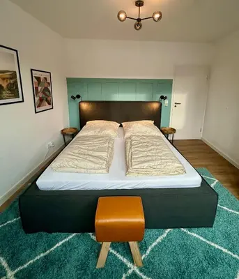Ein Bett oder Betten in einem Zimmer der Unterkunft Karl Central Flats - Netflix - Parkplatz - Balkon