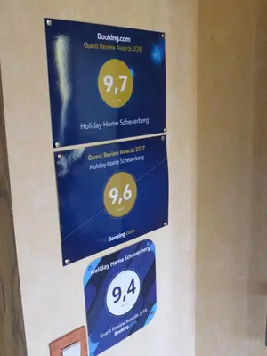 Ein Zertifikat, Auszeichnung, Logo oder anderes Dokument, das in der Unterkunft Holiday Home Scheuerberg ausgestellt ist
