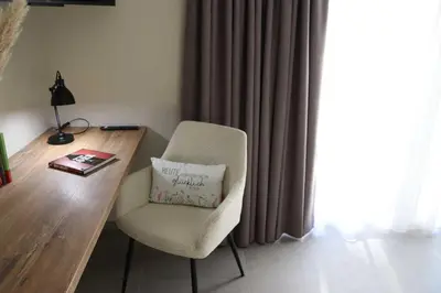 Ein Sitzbereich in der Unterkunft Ferienwohnung Weinbergsliebe