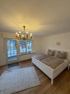 Ein Bett oder Betten in einem Zimmer der Unterkunft Ferienwohnung Jasmin