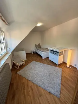 Ein Bett oder Betten in einem Zimmer der Unterkunft Ferienwohnung Jasmin