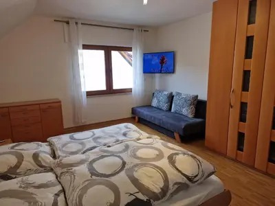 Ein Bett oder Betten in einem Zimmer der Unterkunft Zur Alten Burg