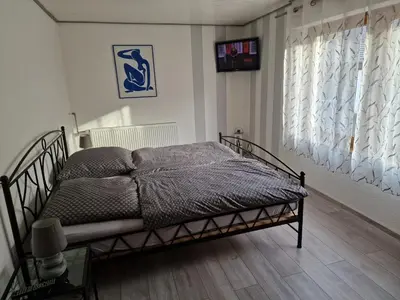 Ein Bett oder Betten in einem Zimmer der Unterkunft Zur Alten Burg