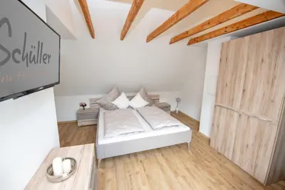 Ein Bett oder Betten in einem Zimmer der Unterkunft Haus Schüller