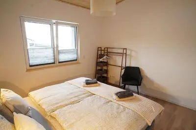 Ein Bett oder Betten in einem Zimmer der Unterkunft Ferienwohnung Traumpanorama im HerberHaus Hunsrück