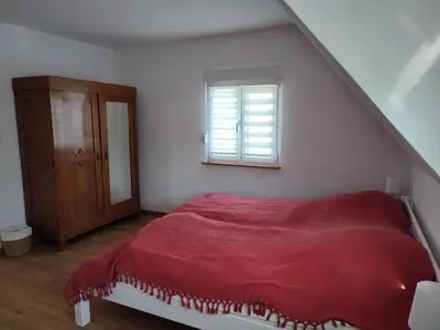 Ein Bett oder Betten in einem Zimmer der Unterkunft Ferienhaus Änni Kempenich