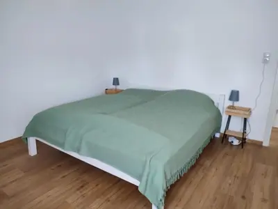Ein Bett oder Betten in einem Zimmer der Unterkunft Ferienhaus Änni Kempenich