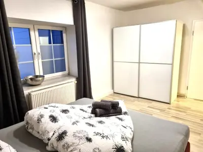 Ein Bett oder Betten in einem Zimmer der Unterkunft Eifelauszeit - Wohnung Klein
