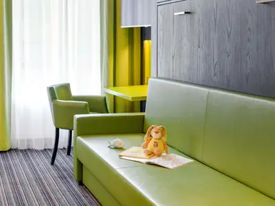 Ein Sitzbereich in der Unterkunft Ibis Styles Trier