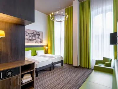 Ein Bett oder Betten in einem Zimmer der Unterkunft Ibis Styles Trier