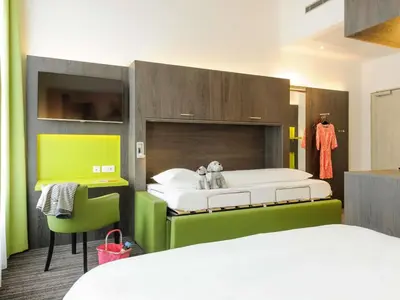 Ein Bett oder Betten in einem Zimmer der Unterkunft Ibis Styles Trier