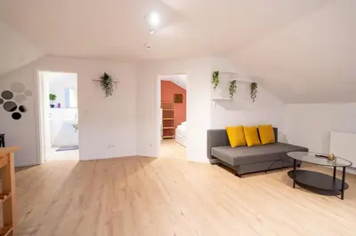 Ein Sitzbereich in der Unterkunft Penthouse Wohnung mit Terrasse