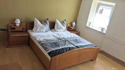 Ein Bett oder Betten in einem Zimmer der Unterkunft Ferienhaus Eckstein