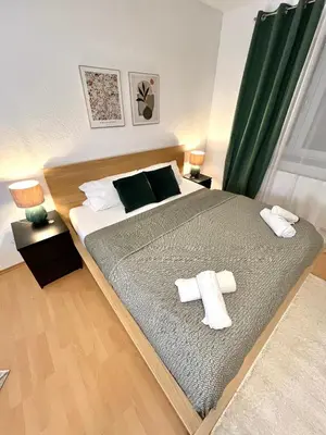 Ein Bett oder Betten in einem Zimmer der Unterkunft Koblenz Studio City Apartment