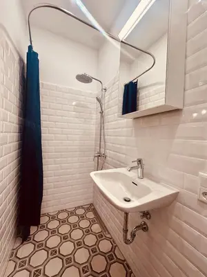 Ein Badezimmer in der Unterkunft Appartement Rheinfelsblick - Historische Eleganz und moderner Komfort