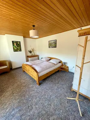 Ein Bett oder Betten in einem Zimmer der Unterkunft Haus Mindermann