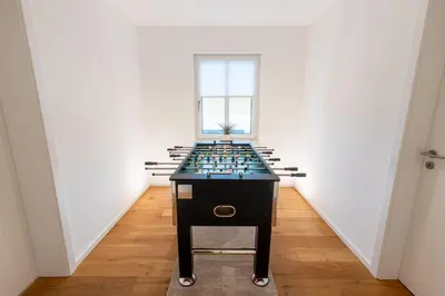 Eine Spielezimmer in der Unterkunft Vulkan-Villa