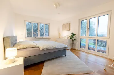 Ein Bett oder Betten in einem Zimmer der Unterkunft Vulkan-Villa