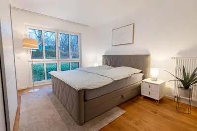Ein Bett oder Betten in einem Zimmer der Unterkunft Vulkan-Villa