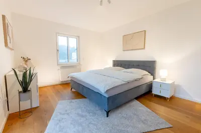 Ein Bett oder Betten in einem Zimmer der Unterkunft Vulkan-Villa
