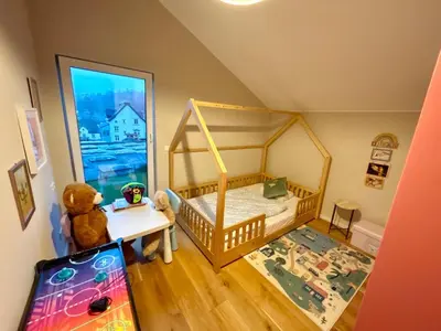 Ein Bett oder Betten in einem Zimmer der Unterkunft Ron vacation home in Gerolstein