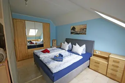 Ein Bett oder Betten in einem Zimmer der Unterkunft Beilsteiner Ferienwohnungen