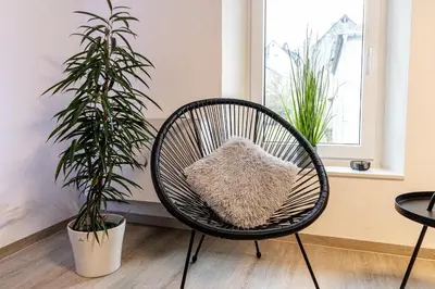 Ein Sitzbereich in der Unterkunft FeWoMo Exclusives Moselappartment, Boots Slipanlage, Moselradweg, Zentral, 5 Gäste