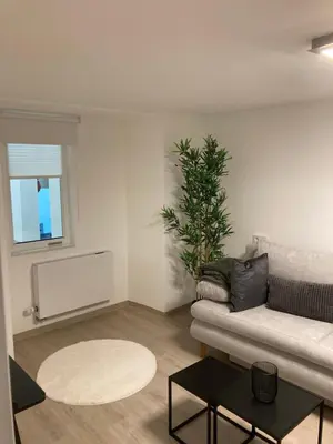 Ein Sitzbereich in der Unterkunft FeWoMo Exclusives Moselappartment, Boots Slipanlage, Moselradweg, Zentral, 5 Gäste