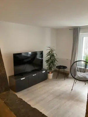 Ein Sitzbereich in der Unterkunft FeWoMo Exclusives Moselappartment, Boots Slipanlage, Moselradweg, Zentral, 5 Gäste