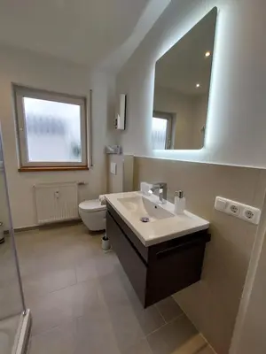 Ein Badezimmer in der Unterkunft FeWo's Weinbergblick Wintrich by Brauneberger Hof an der Mosel