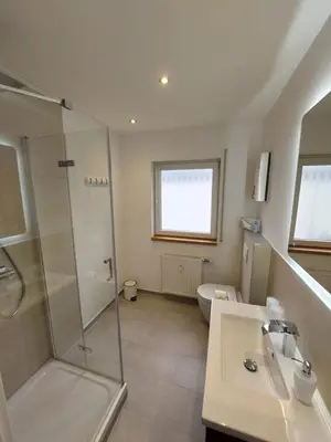 Ein Badezimmer in der Unterkunft FeWo's Weinbergblick Wintrich by Brauneberger Hof an der Mosel