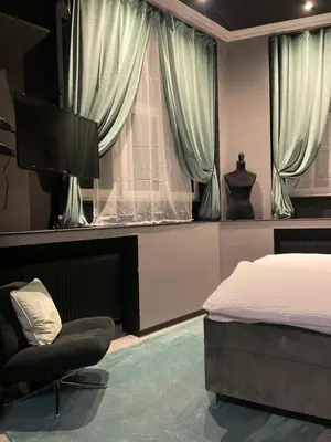 Ein Bett oder Betten in einem Zimmer der Unterkunft City Apartments Trier-Karl-Marx Suite 1