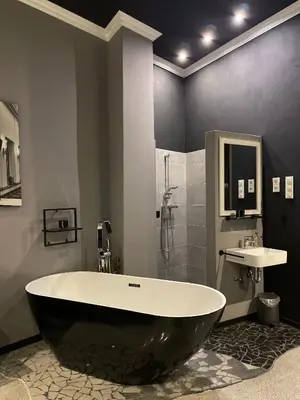 Ein Badezimmer in der Unterkunft City Apartments Trier-Karl-Marx Suite 1