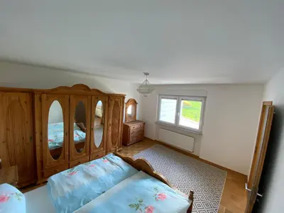 Ein Bett oder Betten in einem Zimmer der Unterkunft Gästehaus Hoppstädten