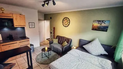 Ein Bett oder Betten in einem Zimmer der Unterkunft Ferienwohnung Moselnest