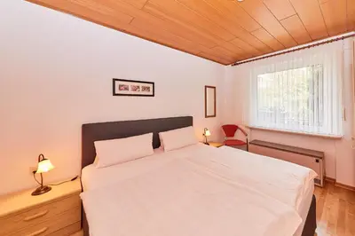 Ein Bett oder Betten in einem Zimmer der Unterkunft Ferienwohnung Liva Wohnung B