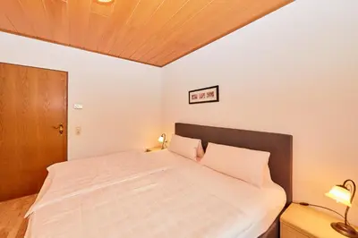 Ein Bett oder Betten in einem Zimmer der Unterkunft Ferienwohnung Liva Wohnung B